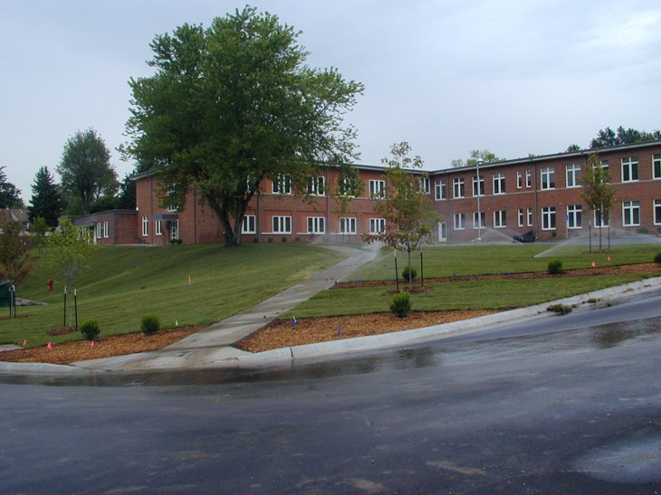 1950’s school building conversion (24 units) and 12 new patio homes as affordable senior housing.